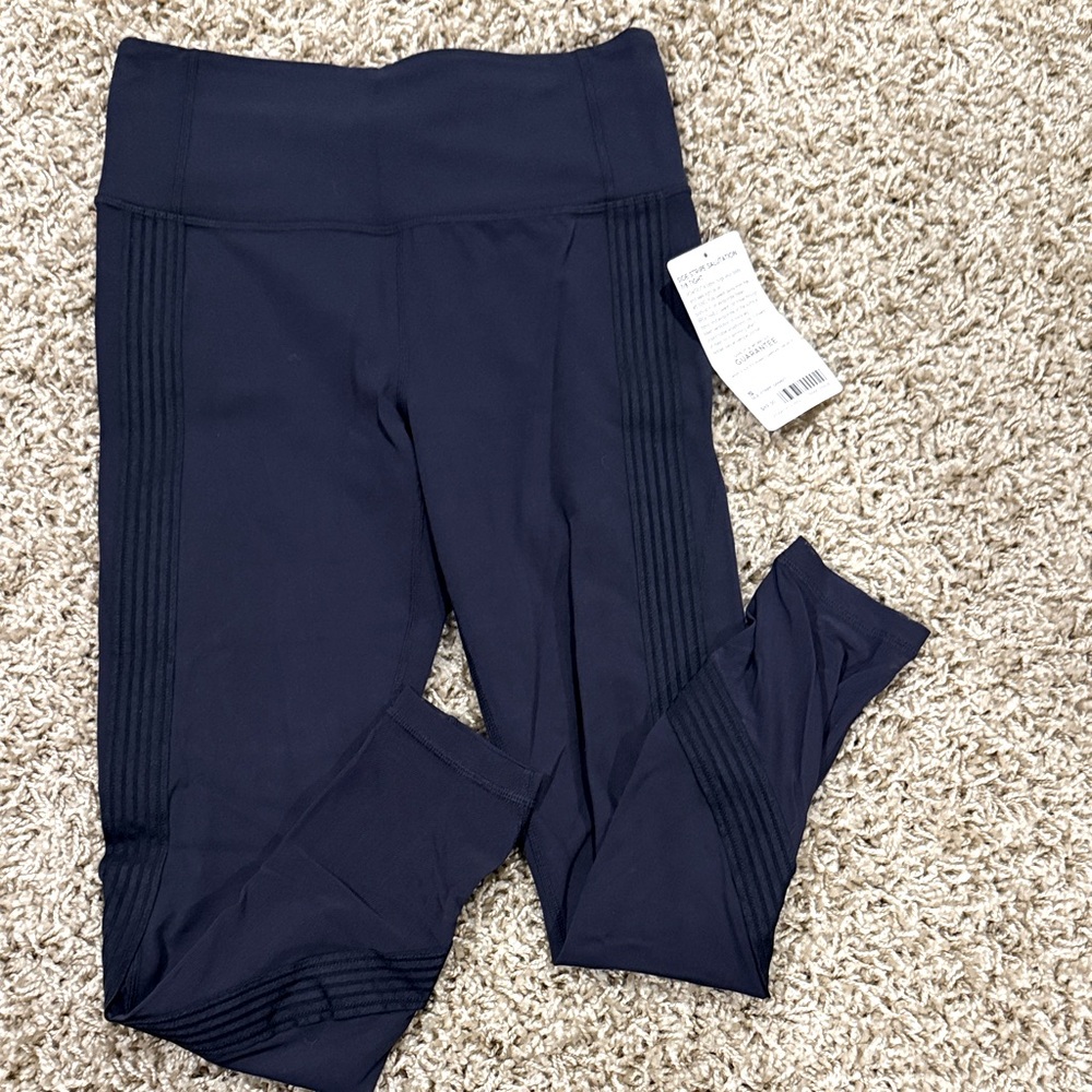 Athleta women’s Salutation 7/8 length leggings size small